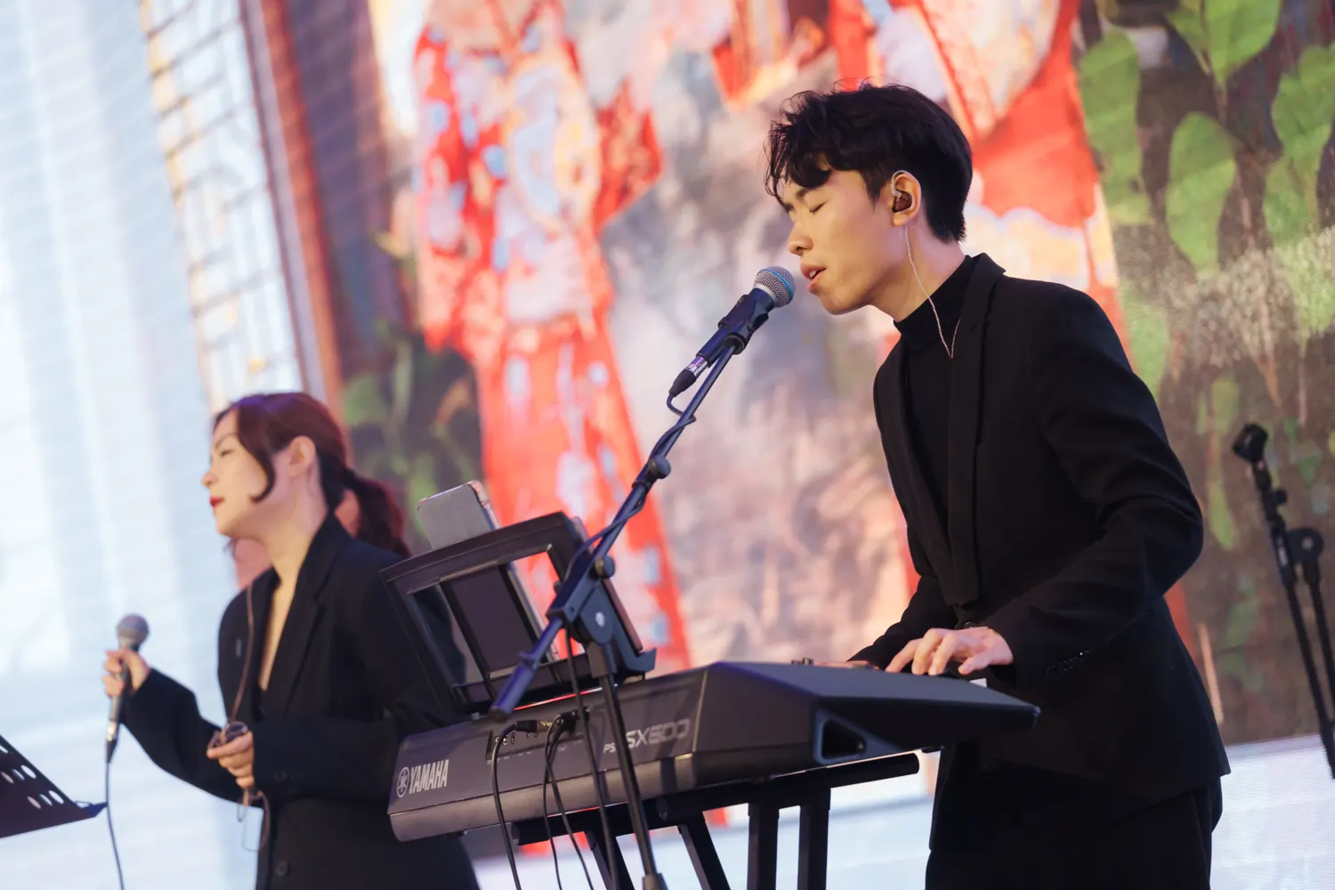 Live music duo performing at a wedding dinner